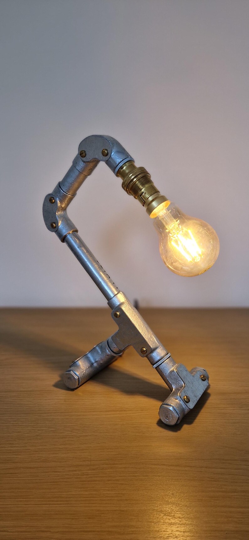 Handmade industrial lamp, perfect for modern home decor, featuring galvanized steel, brass. Steampunk decor style