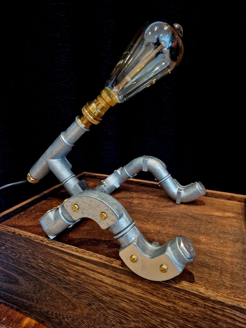 Industrial lighting gift showing the robot lamp, included LED bulb, professionally made