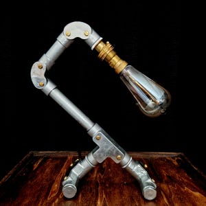 Handmade industrial lamp, perfect for modern home decor, featuring galvanized steel, brass. Steampunk decor style