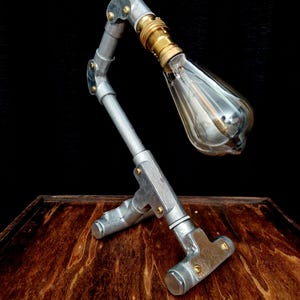 Handmade industrial lamp, perfect for modern home decor, featuring galvanized steel, brass. Steampunk decor style