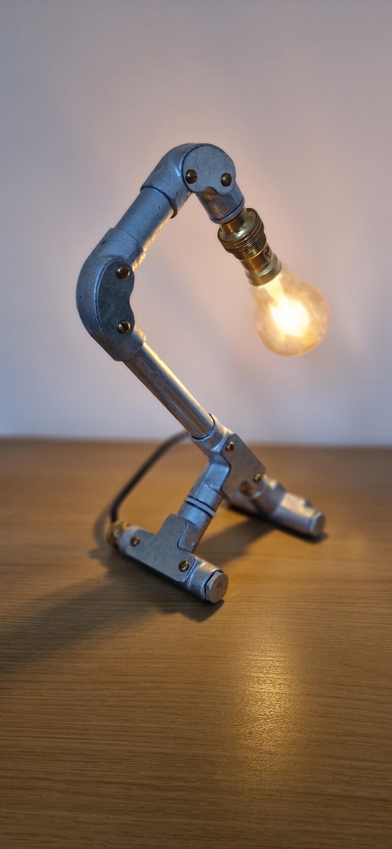 Unique Steampunk industrial lamp, perfect for modern home decor, featuring galvanized steel, brass. Steampunk decor style