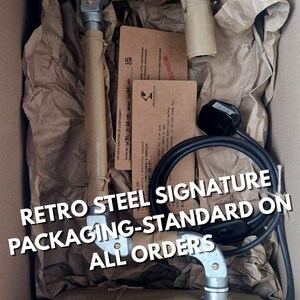 Hand-wrapped industrial steel decor in signature paper and twine, reflecting the raw urban aesthetic and artisan craftsmanship of Retro Steel Co
