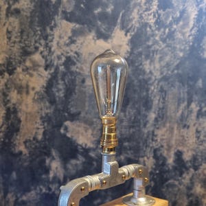 Handmade industrial lamp, perfect for modern home decor, featuring galvanized steel, brass
