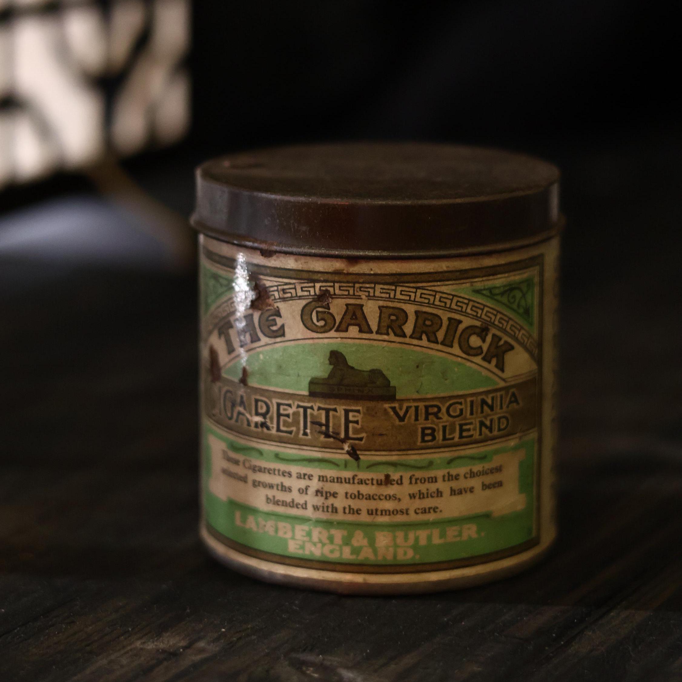 can of cigarettes unopened Tin 50 Player's Navy Cut Medium Cigarettes, This cigarette tin is a
