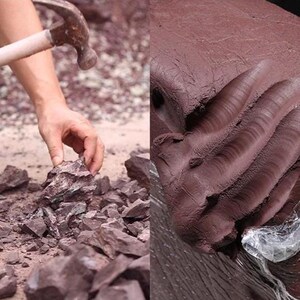 May include: A person's hand using a hammer to break apart reddish-brown rocks. The image also shows a large block of the same material, possibly clay or stone, with visible texture and a plastic wrap.