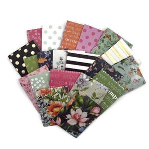 May include: A collection of patterned fabric squares in various designs, including polka dots, stripes, floral, and botanical prints. Colors include black, gold, pink, green, and white. Some squares have text. Ideal for quilting or crafting projects.