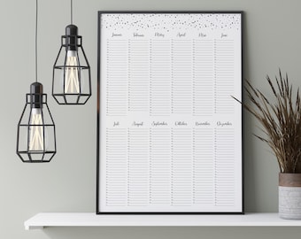 May include: A black and white printable calendar with a black frame and a white background. The calendar is decorated with small black dots. The calendar is labeled with the months of the year in German.