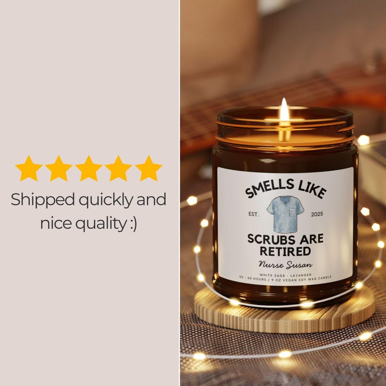May include: A lit brown glass jar candle on a wooden coaster. The candle has a white label with the text "Smells Like Scrubs Are Retired Nurse Susan". The candle is scented with white sage and lavender.