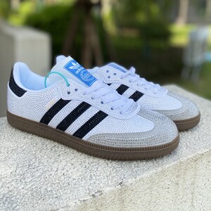 Adidas bianche lucide discount
