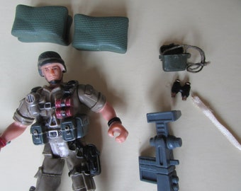 Figura vintage de GI Joe de 3,75 pulgadas con accesorios.