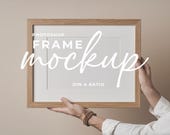 A3 Frame Mockup PSD Oak Wood Landscape Held Frame Poster Mockup Smart Object Horizontal Male Model Digital Download