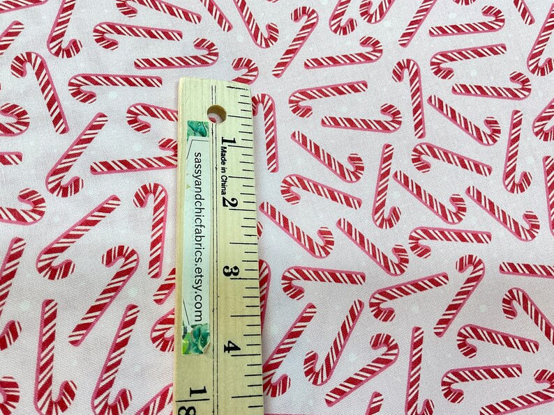 Candy Cane Ruler Tossed Candy Canes and Dots Pink Background, 100% Quilting Cotton ...