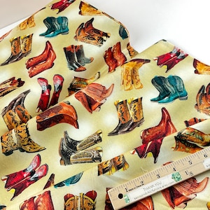 Tossed Boots Butter Background, 100% Quilting Cotton Fabric ~ Big Sky Country Collection from Michael Miller Fabrics