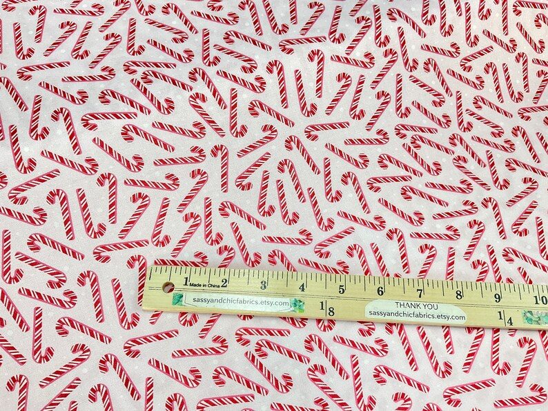 Candy Cane Ruler Tossed Candy Canes and Dots Pink Background, 100% Quilting Cotton ...