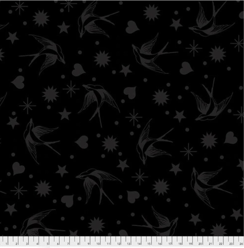 May include: Black fabric featuring a repeating pattern of swallows, stars, hearts, and dots in dark grey. The design provides a subtle contrast against the black background. Suitable for sewing or crafting projects.