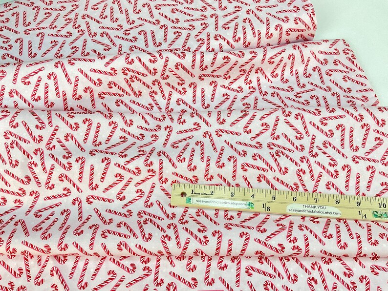 Candy Cane Ruler Tossed Candy Canes and Dots Pink Background, 100% Quilting Cotton ...