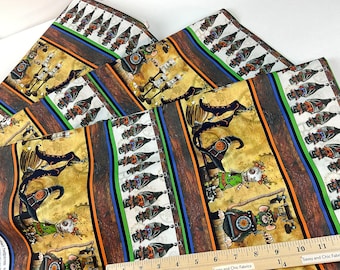 May include: Halloween-themed fabric with steampunk robot designs, witch hats, and bats. The fabric has a tan background with brown, green, and orange stripes. The fabric is measured with a ruler.