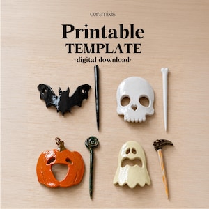 May include: A printable template digital download from ceramixis featuring ceramic-style shapes including a black bat, a white skull, an orange pumpkin, and a cream ghost, alongside four slender pointed sticks in black, white, green, and orange.