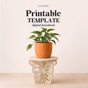 May include: An orange ceramic pot with a green plant sits on a small, round, off-white table supported by a butterfly-shaped base. The words "Printable TEMPLATE - digital download-" are at the top of the image.