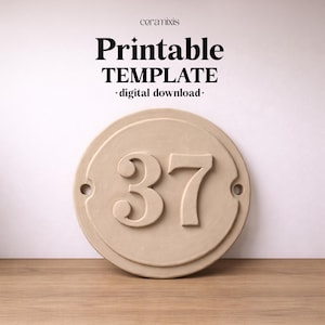 May include: A beige, circular house number plaque with the number "37" in a bold, serif font. The plaque has a raised border and two small holes. The text "Printable TEMPLATE - digital download-" is at the top.