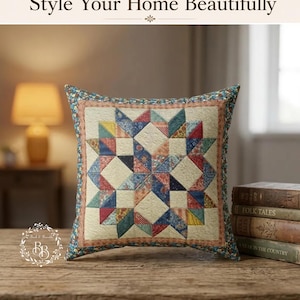 Almofada decorativa com estampa de estrelas em patchwork