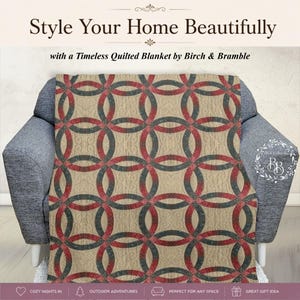 May include: A quilted blanket featuring a repeating double wedding ring pattern in shades of red, dark green, and beige. The text Style Your Home Beautifully with a Timeless Quilted Blanket by Birch & Bramble is printed above the blanket.