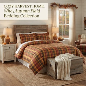 May include: A bedding set featuring a plaid pattern in shades of orange, red, yellow, and brown. The text COZY HARVEST HOME: The Autumn Plaid Bedding Collection is displayed at the top. The set includes a duvet cover and matching pillow shams.