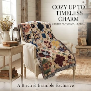 May include: A patchwork throw blanket with a star pattern in muted tones of navy, burgundy, cream, and sage green draped over a white wooden armchair. The text reads: COZY UP TO TIMELESS CHARM LIMITED EDITION COLLECTION A Birch & Bramble Exclusive.