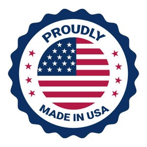 May include: A circular badge with a scalloped dark blue border featuring the text PROUDLY MADE IN USA in dark blue capital letters. The center contains a circular United States flag graphic surrounded by eight small red stars on a white background.