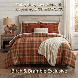 Peut inclure: Un lit avec une couette à carreaux dans des tons orange, jaune et vert, surmontée d'un jeté de lit en tricot torsadé crème. Le lit comprend deux oreillers orange et un coussin lombaire crème. Le texte indique : Today Only, Save 20% with coupon code THANKYOU20.