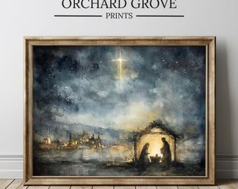 May include: Watercolor print in a wooden frame depicting a nativity scene under a starry night sky. The artwork features a glowing star, a silhouette of a town, and the text "ORCHARD GROVE PRINTS".