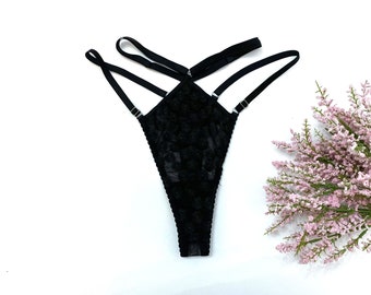 Embroidered black floral scrappy thong with black daisy flowers