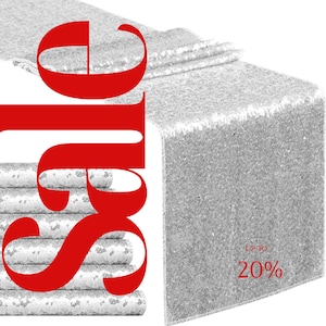 May include: A stack of silver sequin table runners and a single runner displayed on a white background. The word "SALE" is in large red letters, with "UP TO 20%" in red text.