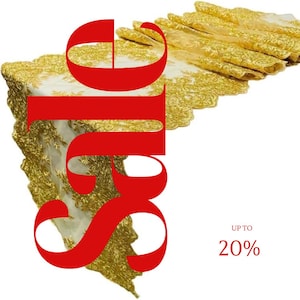 May include: A gold embroidered table runner with a scalloped edge. The word "SALE" is displayed in large red letters, with the text "UP TO 20%" in the corner.