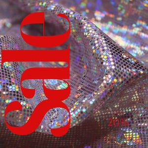 May include: Close-up of a shimmering fabric with a sequined pattern. The fabric has a pinkish hue with iridescent sequins. Large red text that says "SALE" is overlaid on the fabric. The text "20%" is also visible.