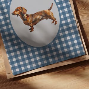 A vintage asethetic digital download art print. Blue watercolor gingham pattern painted on handmade textured paper with an oil painting of a dachshund dog in the center.  Cute trendy nursery decor or dog lover art