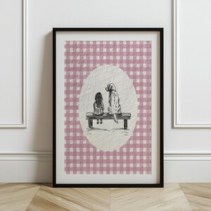 a cute vintage style print of a little girl sitting beside a golden retriever dog on a bench.  Hand drawn dog sketch on a textured paper with a pink gingham watercolor background.  Retro style. Cute and trendy girl nursery wall decor