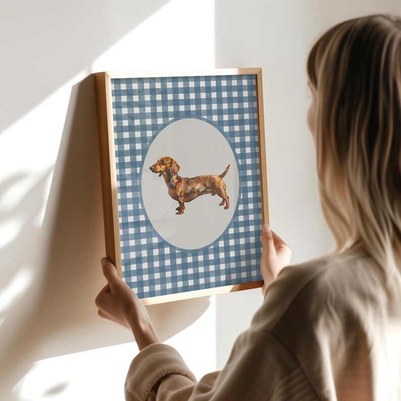 A vintage asethetic digital download art print. Blue watercolor gingham pattern painted on handmade textured paper with an oil painting of a dachshund dog in the center.  Cute trendy nursery decor or dog lover art
