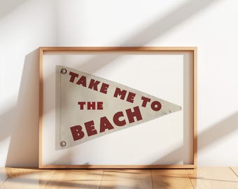 May include: A framed pennant with the text "Take Me To The Beach" in red letters on a white background.
