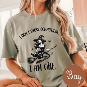 I dont cause commotions, iam one shirt, wicked shirts, cute witch shirt, defying gravity, wicked inspired apparel, wicked gifts, elphaba tee