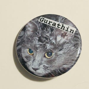 Gurathin- TMBD Inspired Pinback Button, 1.5 inch