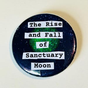 May include: A circular badge featuring a dark blue, starry night design. White text reads "The Rise and Fall of Sanctuary Moon". A green orb is in the center of the badge.