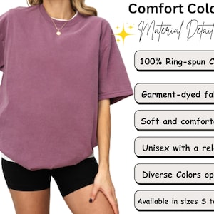 Pode incluir: Uma camiseta Comfort Colors malva com mangas curtas e um ajuste descontra&iacute;do. A camisa &eacute; feita de 100% algod&atilde;o ring-spun e tecido tingido em pe&ccedil;a. A imagem tamb&eacute;m mostra os detalhes do material, macio e confort&aacute;vel, unissex, tamanhos S a 4XL.
