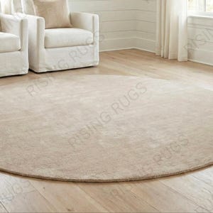 Handmade Ivory Wool Round Rug – Minimalist Nursery Carpet