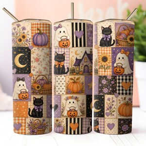 May include: A cylindrical stainless steel tumbler featuring a patchwork design of Halloween-themed illustrations including black cats, ghosts holding jack-o'-lanterns, pumpkins, sunflowers, purple hearts, a crescent moon, and a haunted house.