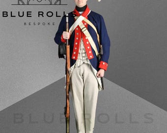 May include: A man in a blue and red uniform with a white sash and a tricorn hat holds a musket. He is standing in front of a gray background with the text "BLUE ROLLS BESPOKE" above him.