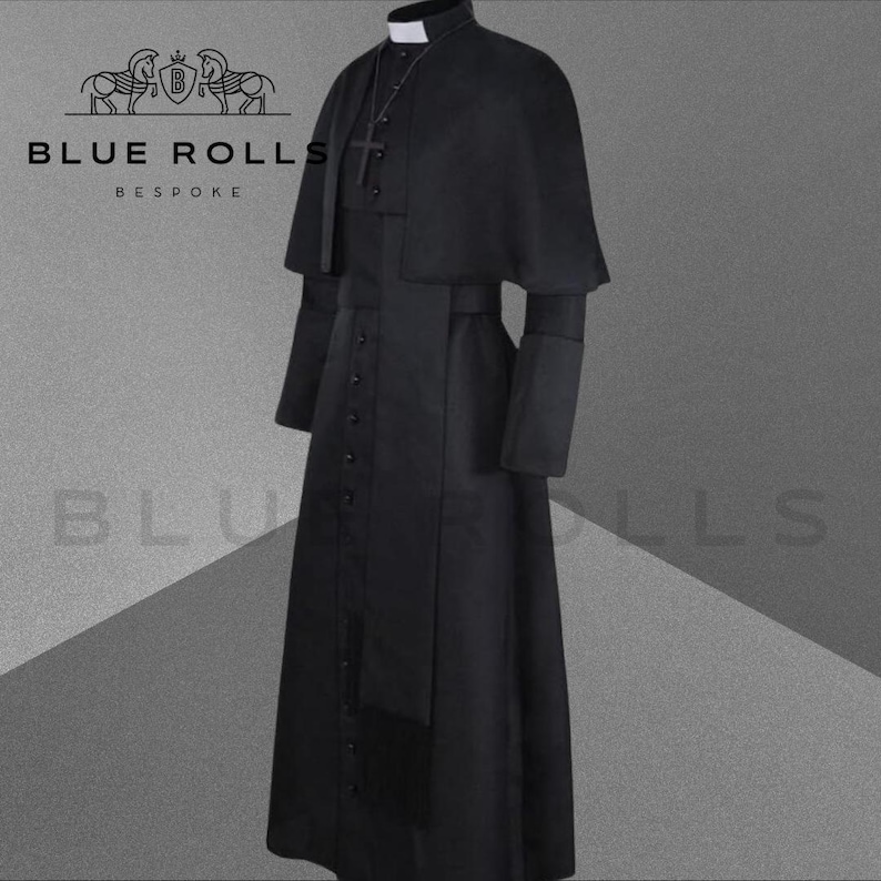 May include: A black cassock with a cape, a white collar, and a black sash. The cassock has a row of buttons down the front and a cross on the chest.