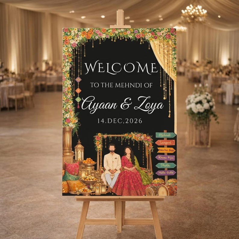 May include: A wooden easel displays a black sign with floral and gold accents. The sign reads "WELCOME TO THE MEHNDI OF Ayaan & Zoya 14.DEC.2026." Below is an illustration of a couple. Colorful directional signs are on the right.