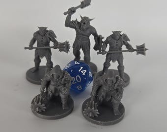 May include: A set of five unpainted gray plastic miniature figures depicting armored warriors in combat poses, each holding a spiked mace or club, arranged in a circle around a single blue twenty-sided die with white numbers.