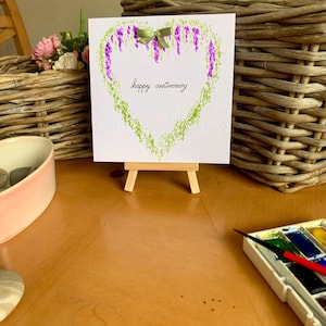 愛、記念日、婚約、結婚のための藤のハートを描いた、パーソナライズされた、オーダーメイドのオリジナル手描き水彩グリーティング カード。